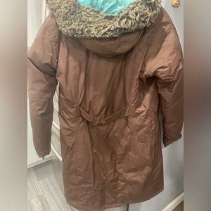 North Face Woman’s Jacket. Brown with turquoise inside.